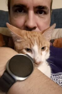 A photo of Christopher and his cat
